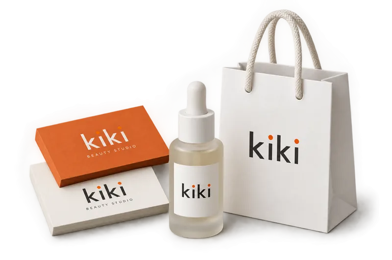 Demo brand identity for Kiki Beauty Studio, with business cards, a serum bottle and a shopping bag